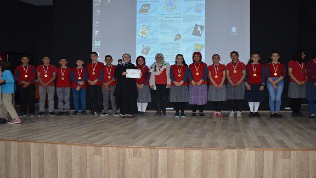 Okuyan İlçe Okuyan Nesil Projesi Kapsamında Başarılı Olan Okullara Ödülleri Verildi.